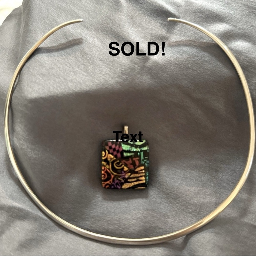 SOLD!  Sterling silver Torque w/ pendant.